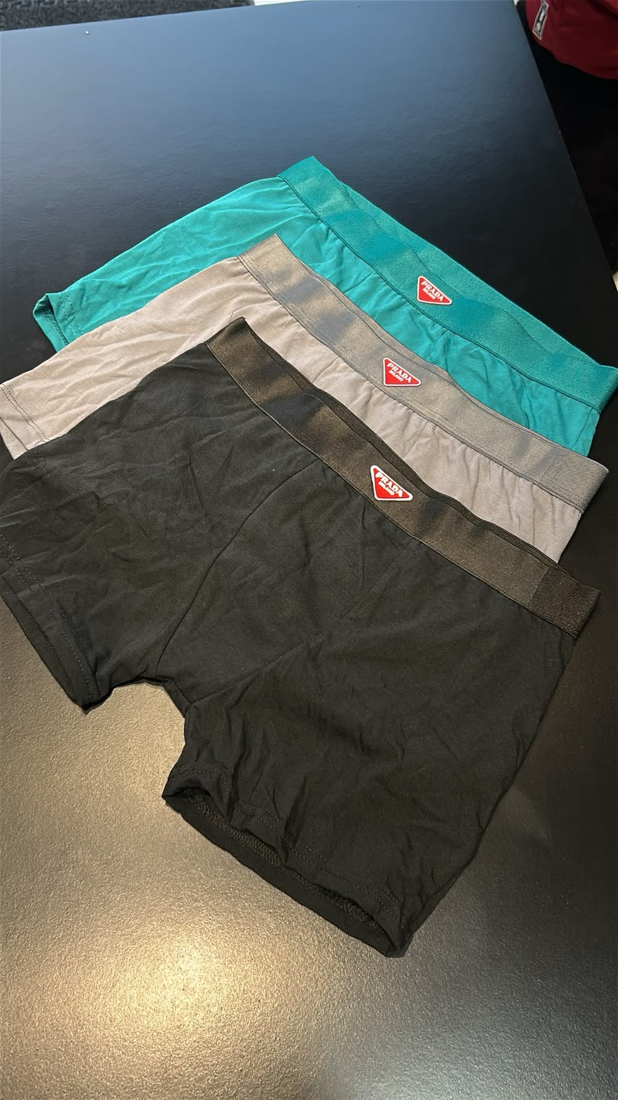 Kit 3 Cuecas Prada (verde, cinza e preta) — kits masculino na Praxedes Griffes